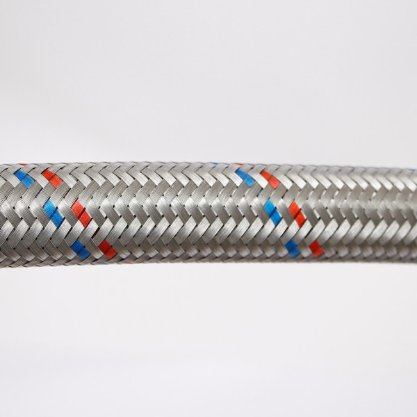 Подводка гибкая антивибрационная Uni-Fitt 600 мм 1" НВ угловая DN 25 оплётка из оцинкованной стали (505S4406)